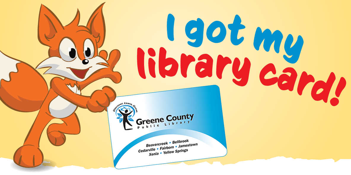 Booker poses with library card